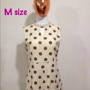 Romper in gold and cream